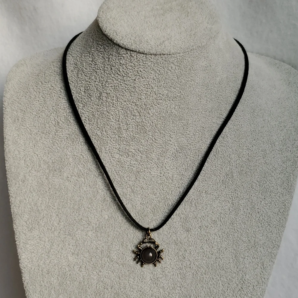 Mens bronze crab charm black suede necklace